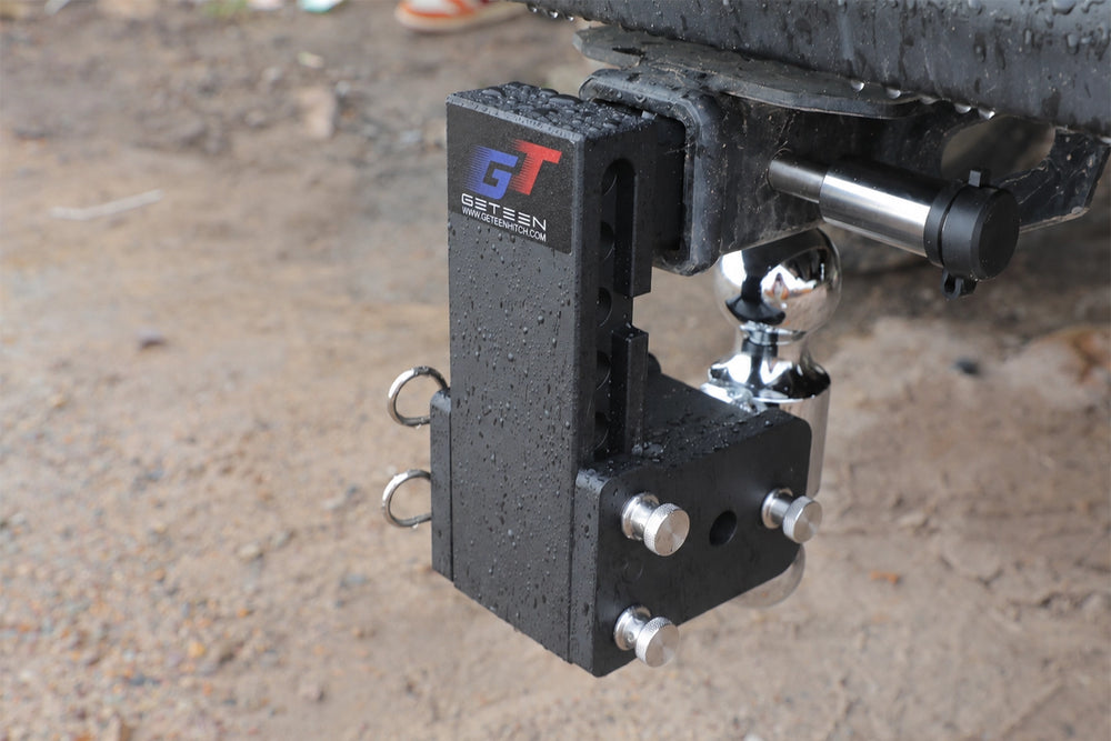 GETEEN dual-ball hitch with quick height adjustment, two ball sizes, stowable design, and included anti-theft lock.