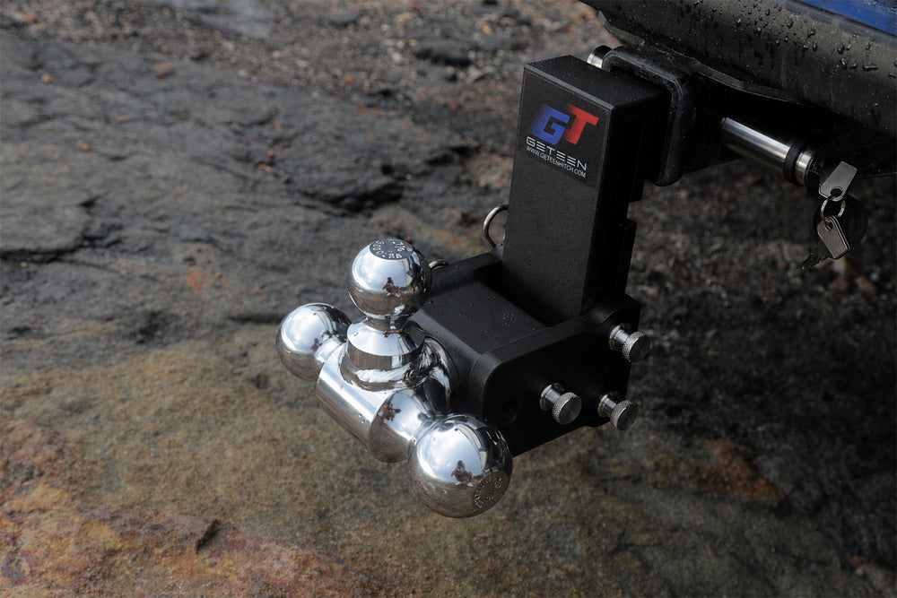 GETEEN dual-ball adjustable trailer hitch with multiple height positions for a level truck and trailer setup.