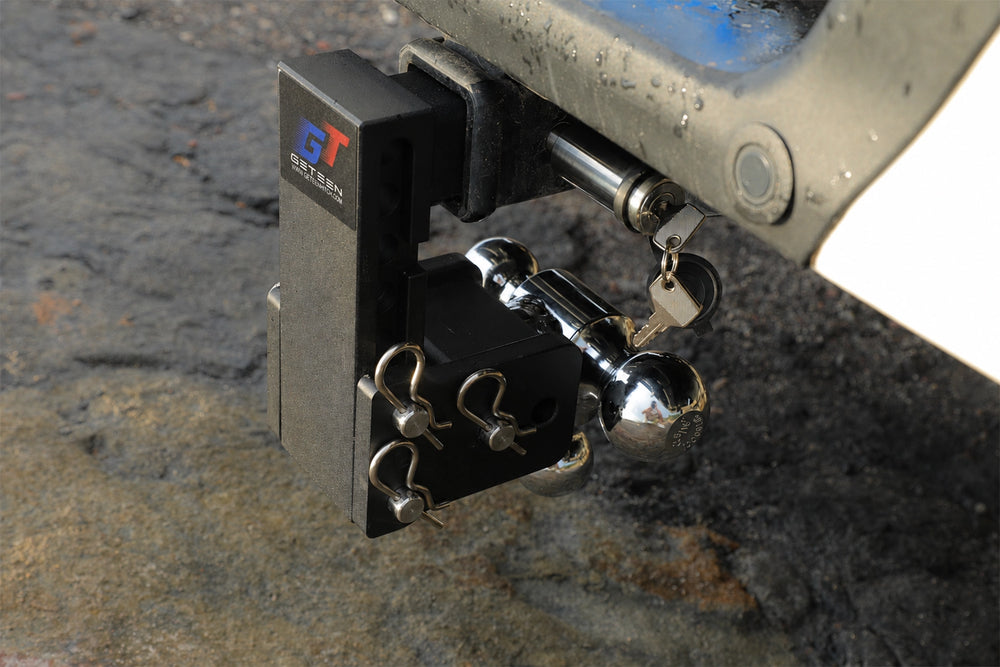 GETEEN tri-ball hitch with three ball sizes, adjustable height, stowable design, and included anti-theft lock for switching between different trailers.